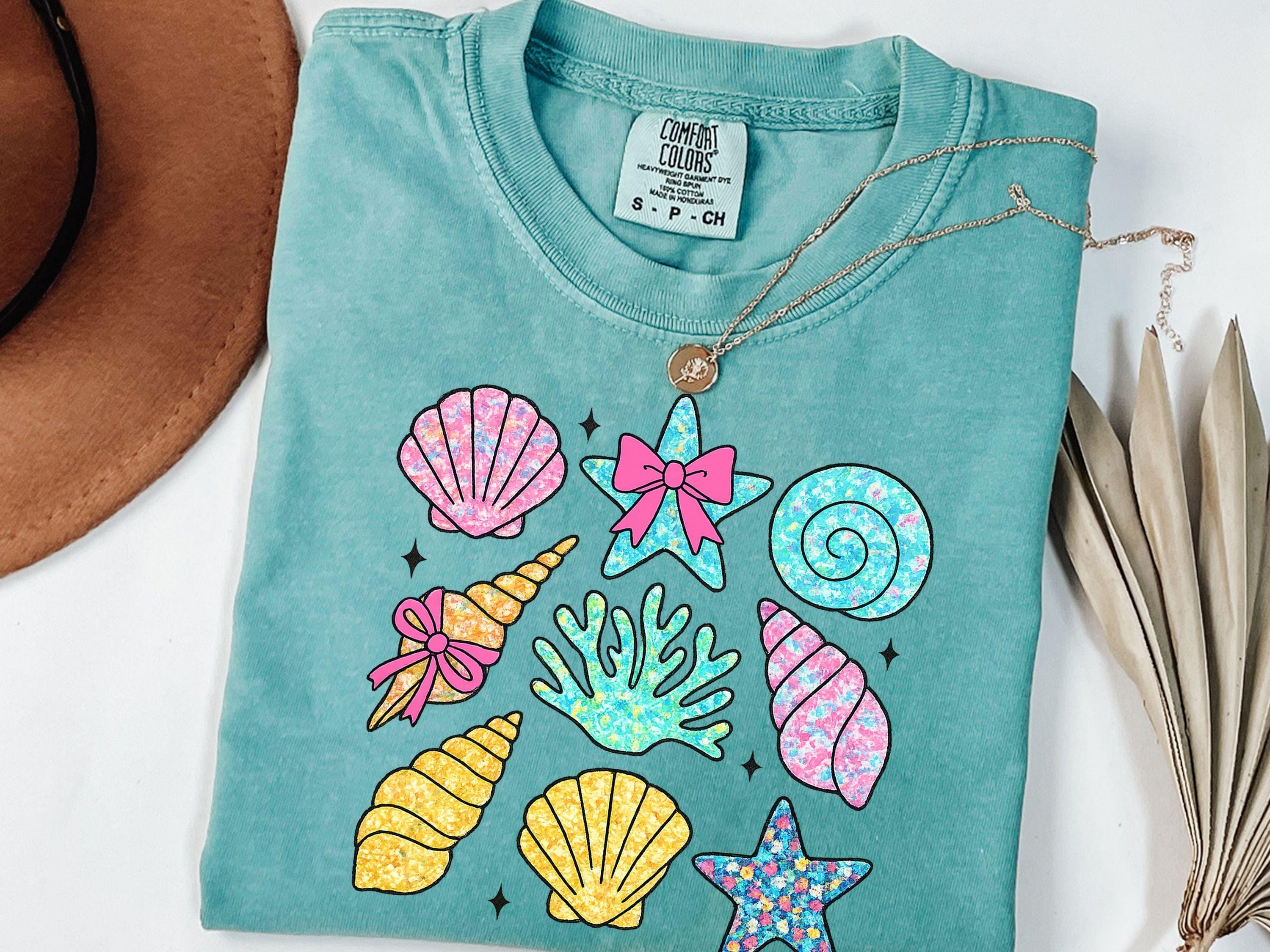 Floral Summer Shirt Wildflower Seashell Clam Summer Cute Seashell Shirt Summer Vibes Tee Beach Vibes Woman Summer Shirt Graphic Tee – Soft Feel · Top Pick For Any Outfit