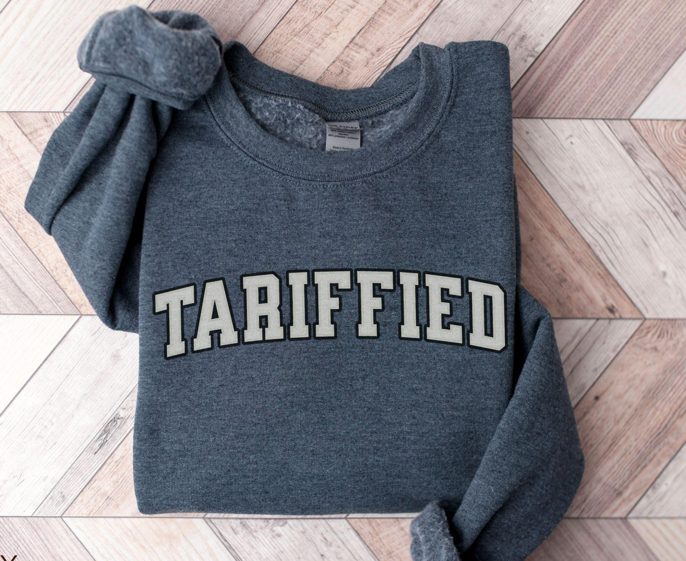 TARIFFIED Sweatshirt Anti Tariff Political Shirt Unisex Varsity Letters Crewneck Anti Trump Sweatshirt Protest Pun Shirt Resist Shirt Sweatshirt – Bold Style · Great Gift For Fans