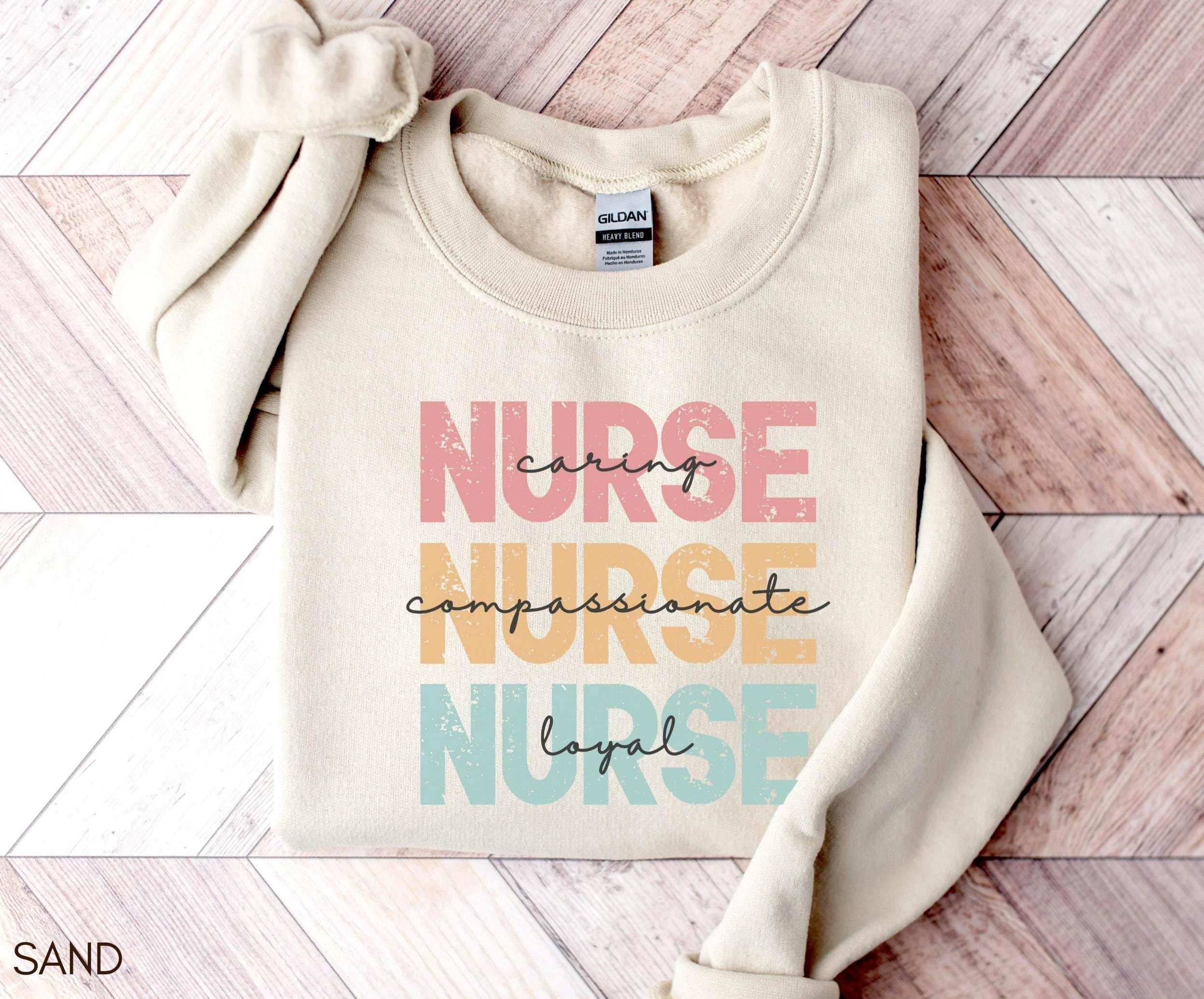 Nurse Sweatshirt Caring Compassionate Nurse Shirt LPN or Nurse Practitioner Crewneck Gift for Nurse or RN Gift Nurse Graduation Gifts Sweatshirt – Premium Graphic · Top Pick For Any Outfit