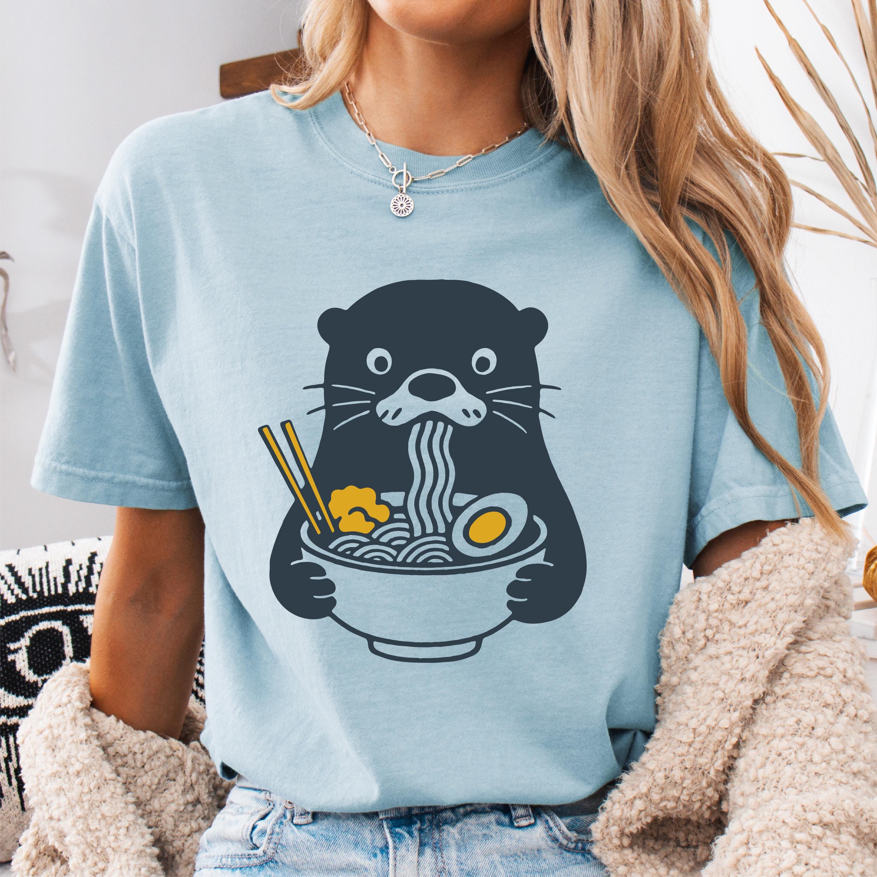 Otter Eating Ramen T Shirt Funny Tee Quirky Animal Food Lover Gift Ramen Lover Shirt Graphic Tee – Everyday Comfort · High-Quality Print