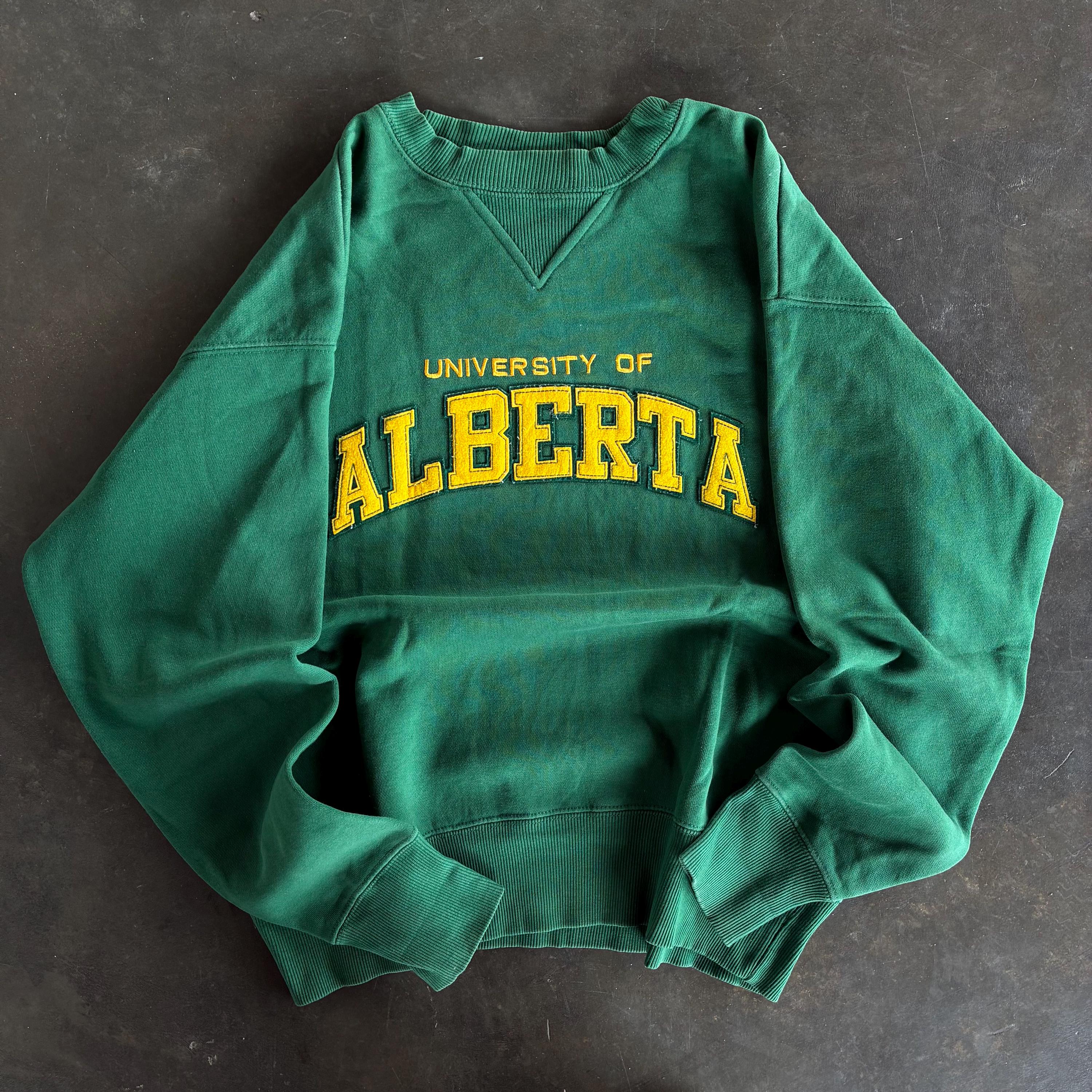 Vintage Y2K Tag University of Alberta Spellout BigLogo Embroidered Sweatshirt Crewneck Sweater Sweater University Colour Green Size NA Sweatshirt – Warm & Stylish · Trending Graphic Apparel