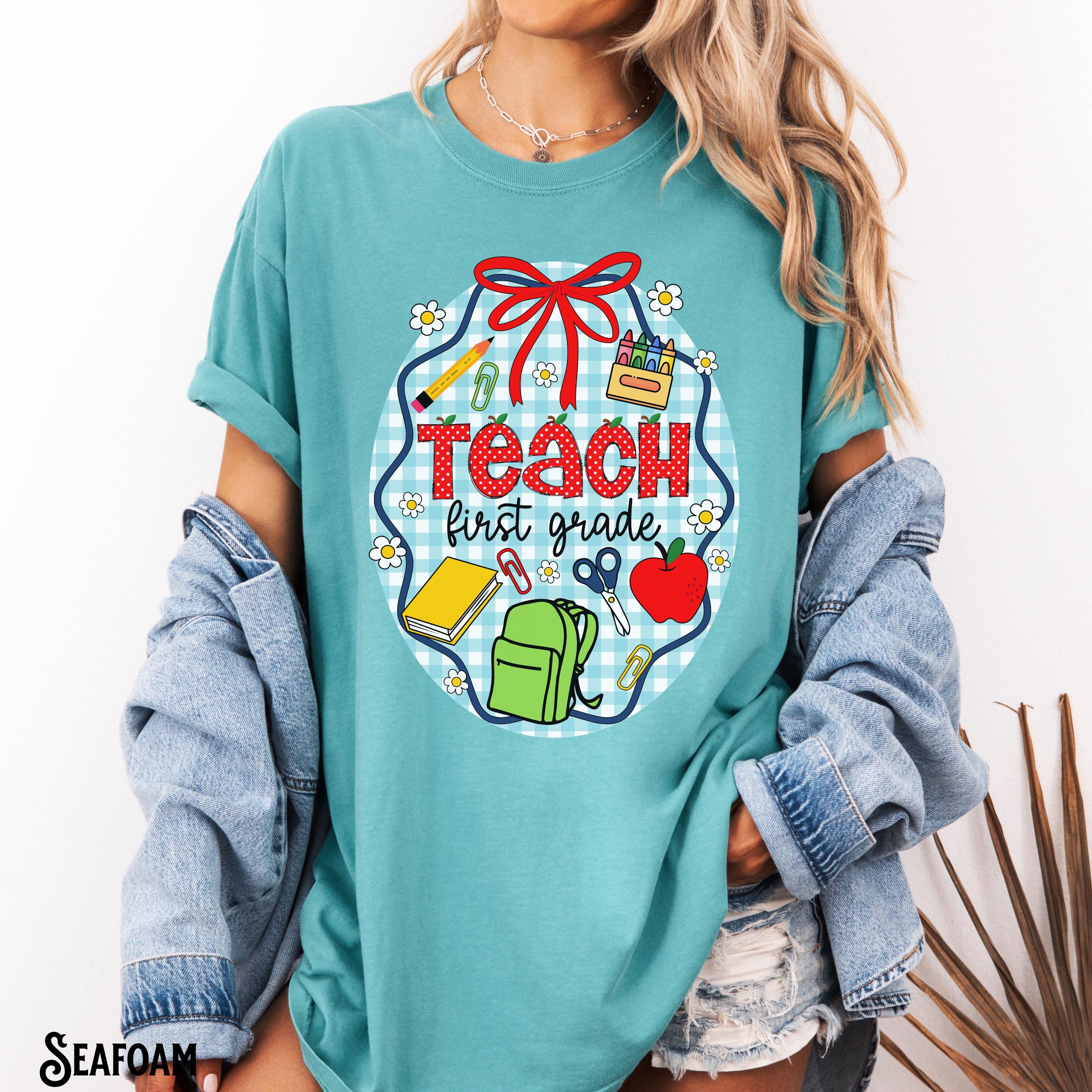 First Grade Teacher Shirt Teacher Tee 1st Grade T Shirt Back To School Gingham Coquette Bow School Supplies Gift Graphic Tee – Bold Style · Trending Graphic Apparel