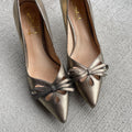 y2k vintage 0039s gold leather kitten heel with bow detail US size 65 Graphic Tee – Feel-Good Design · High-Quality Print