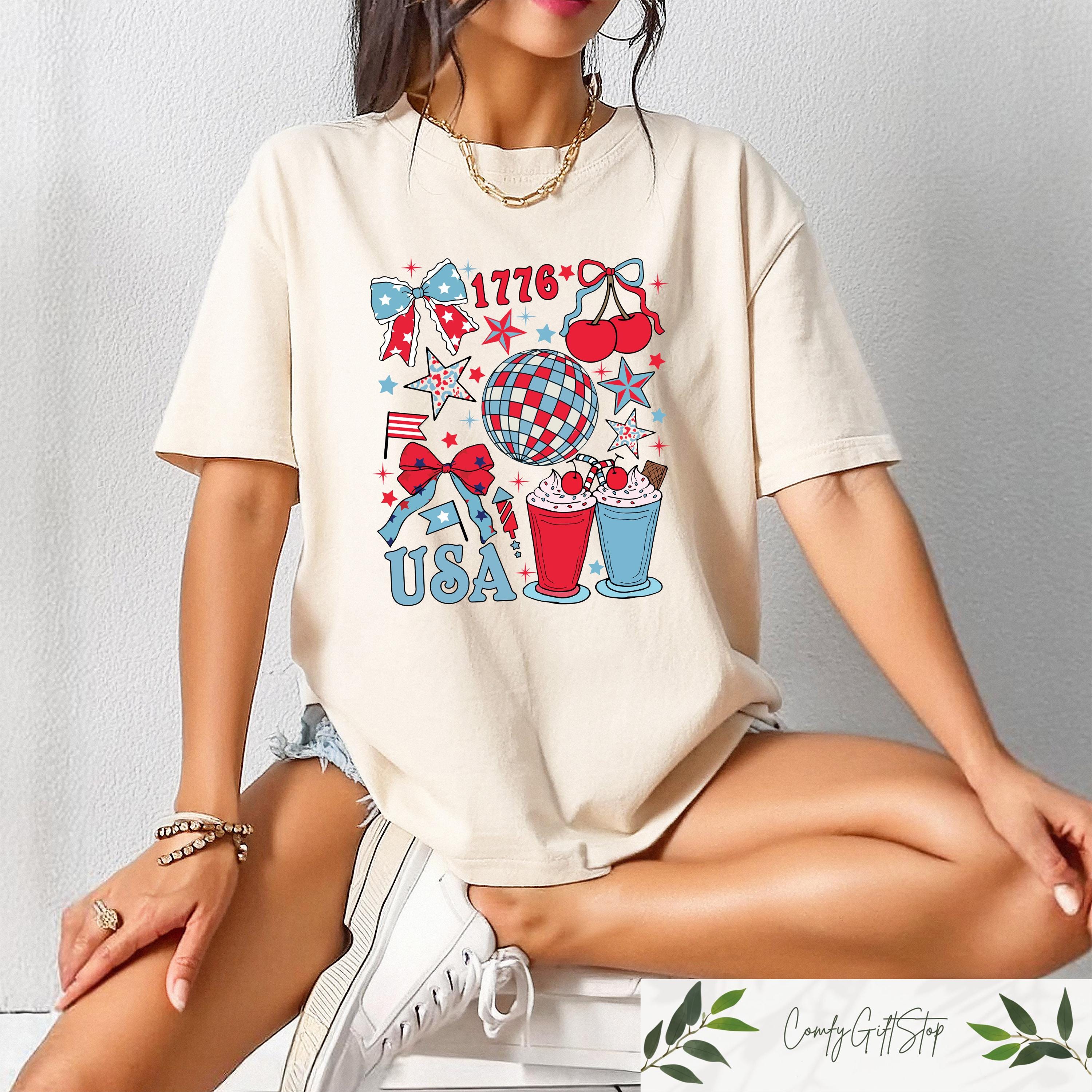 Retro Comfort USA Coquette Shirt 4th Of July T shirt Women39s Patriotic Crewneck Independence Day Gift American Girly Shirt USA Bow Tee Graphic Tee – Bold Style · Trending Graphic Apparel