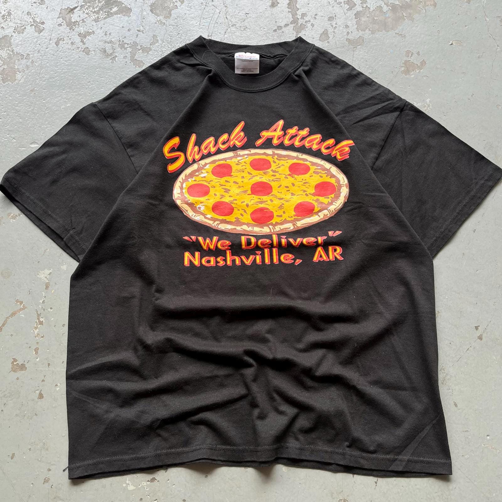 Vintage Y2K Shaq Shack Attack Pizza Nashville Arkansas Shirt Graphic Tee – Fan Favorite · Trending Graphic Apparel