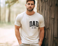 Custom Dad Shirt Cute Fathers Day Gift Christmas Gift For Dad New Dad Shirt Custom Dad Est ShirtGift for GrandpaGift for Grandma Shirt Graphic Tee – Soft Feel · Top Pick For Any Outfit