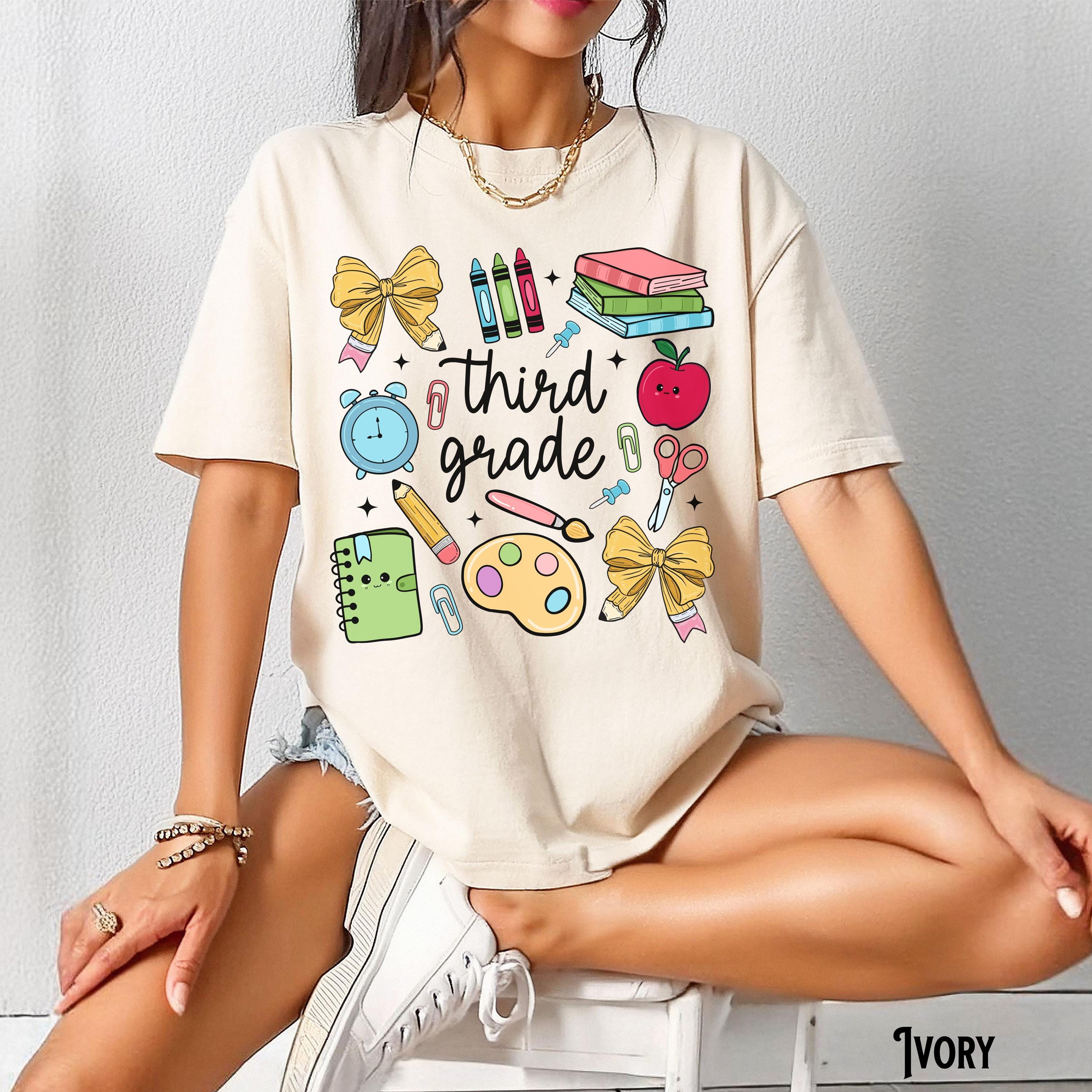 Third Grade Teacher Shirt Teach Tee 3nd Grade T Shirt Back to School Supplies Coquette Doodle Whimsical Teacher Gift Graphic Tee – Aesthetic Look · Trending Graphic Apparel