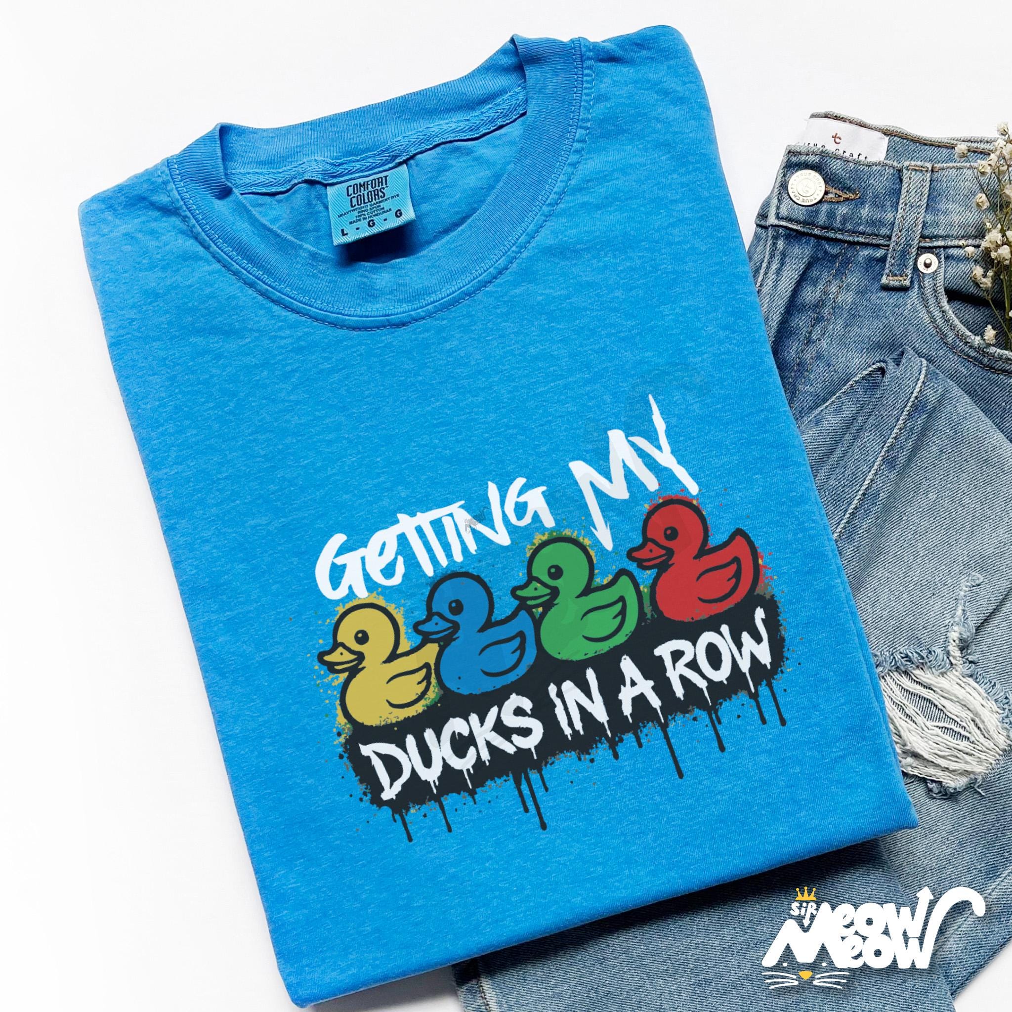 Getting My Ducks in a Row T Shirt Funny Rubber Duck Tee Colorful Graffiti Style Procrastination Gift Graphic Tee – Soft Feel · High-Quality Print