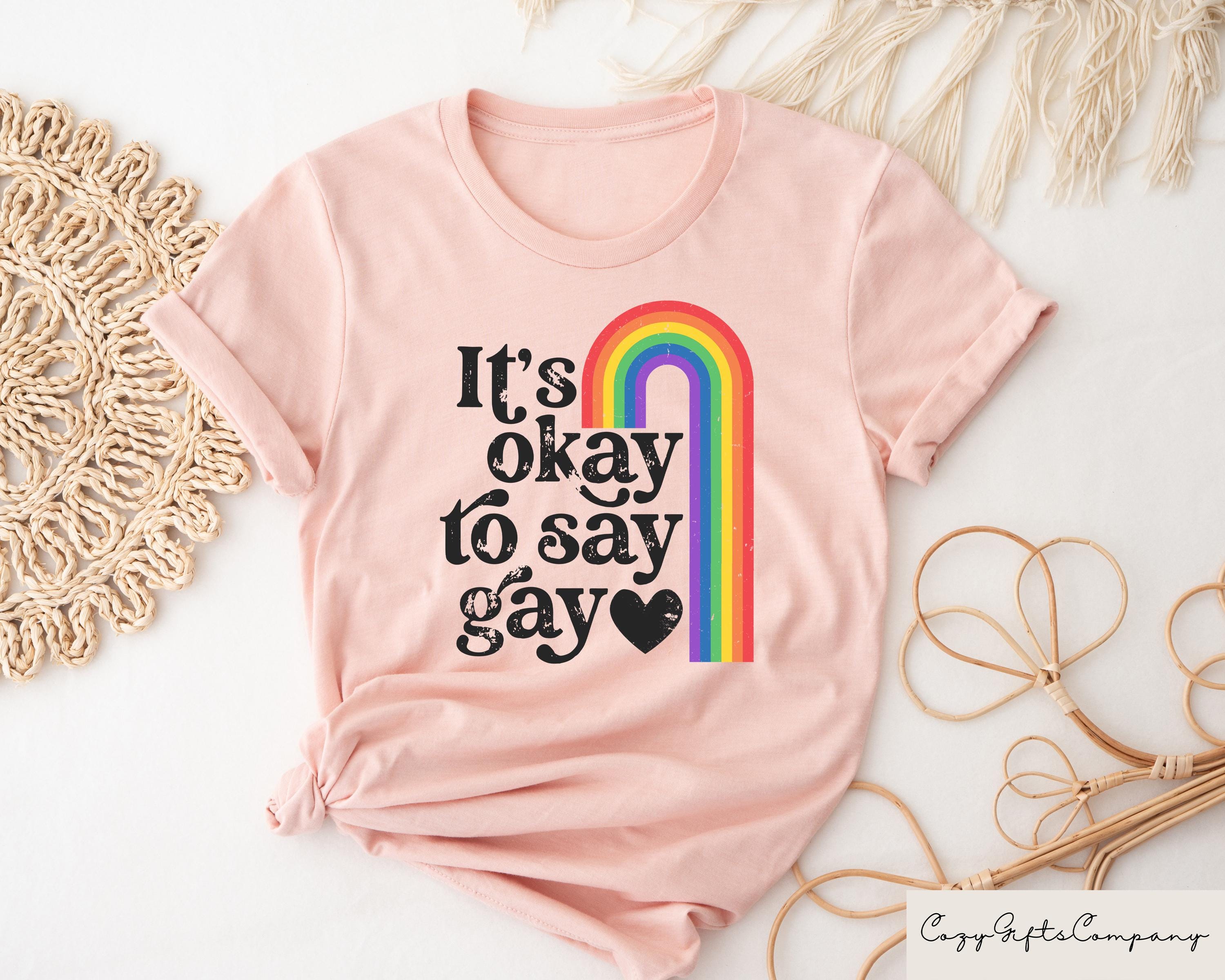 Retro Comfort LGBTQ T shirt It39s OK To Say Gay Shirt Gay Rights Crewneck Human Rights Gift Equality Tee LGBTQ Community Shirt Graphic Tee – Warm & Stylish · Top Pick For Any Outfit
