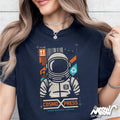 Astronaut T Shirt Space Shipping Graphic Tee Retro Sci Fi Astronaut Shirt Streetwear Space Tee CosmoXPress Design Graphic Tee – Feel-Good Design · High-Quality Print