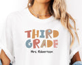 Custom 3RD Grade Teacher Shirt Tee Personalized Teacher Name Back to School Teacher Gift THIRD Grade Teacher Team Shirts Graphic Tee – Warm & Stylish · Top Pick For Any Outfit