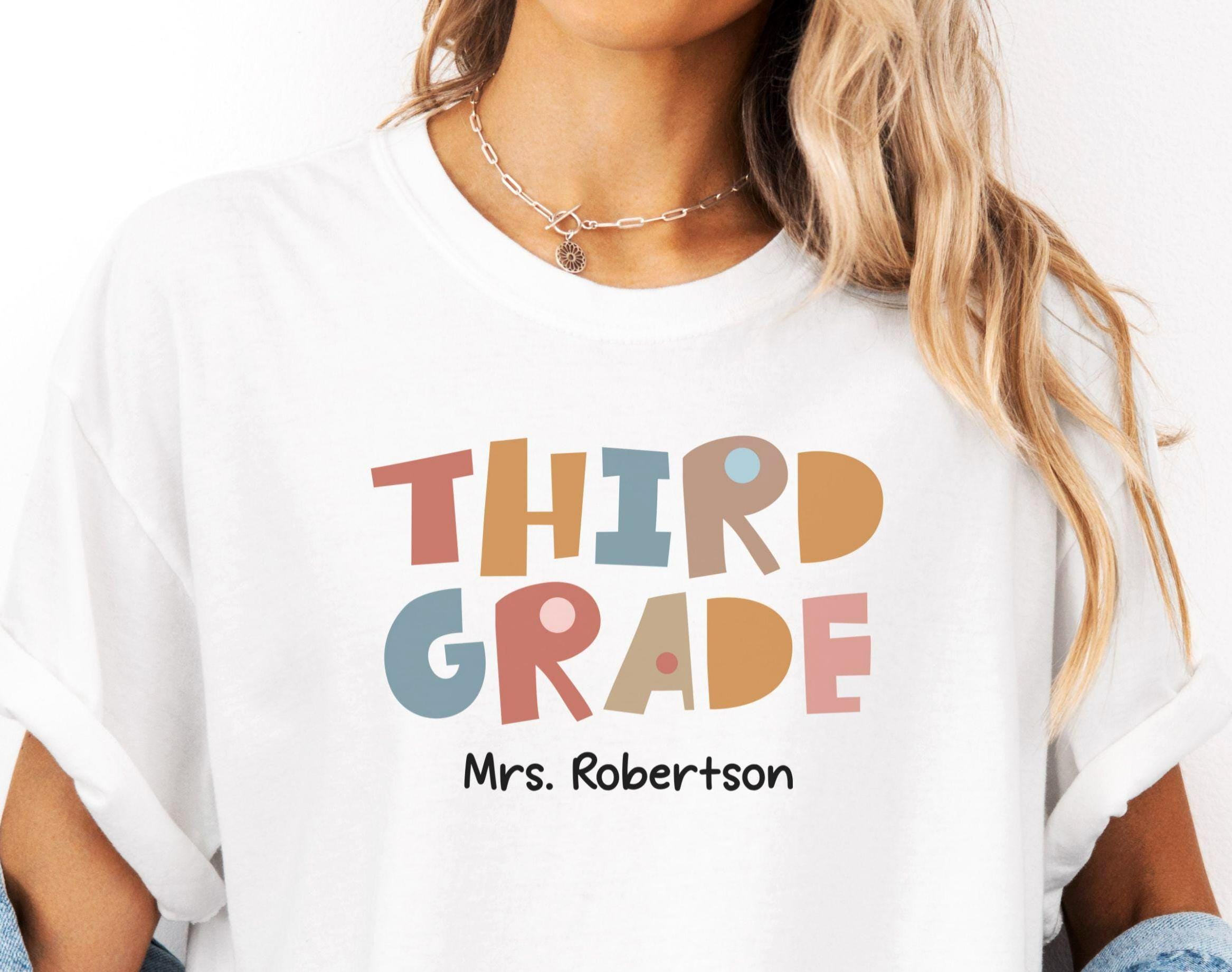 Custom 3RD Grade Teacher Shirt Tee Personalized Teacher Name Back to School Teacher Gift THIRD Grade Teacher Team Shirts Graphic Tee – Warm & Stylish · Top Pick For Any Outfit