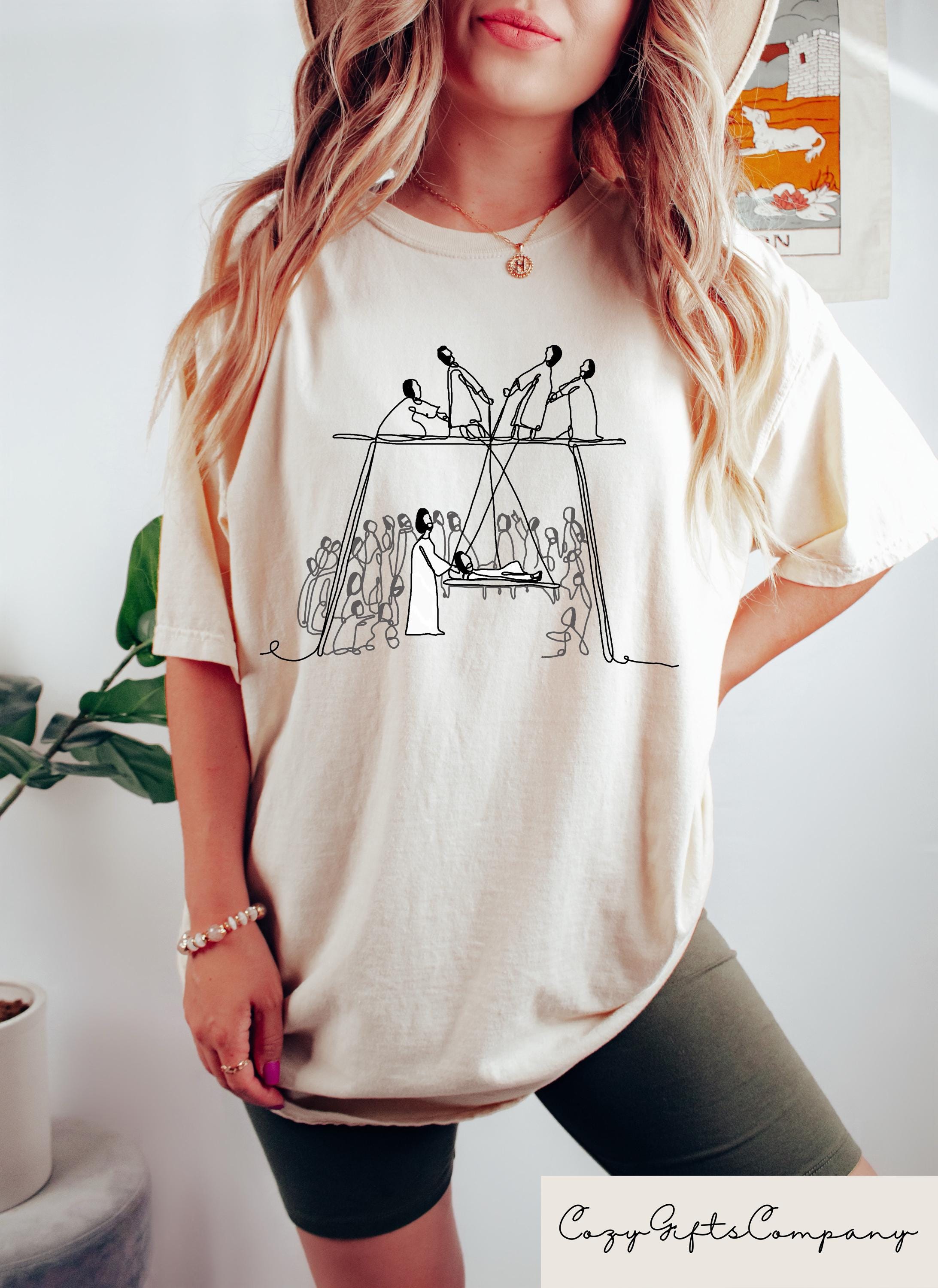 Retro Comfort Christian T shirt Jesus Heals The Man Of Palsy Shirt Let Down Through The Roof Tee Religious Mom Gift Church Squad Tee Graphic Tee – Everyday Comfort · Must-Have Style