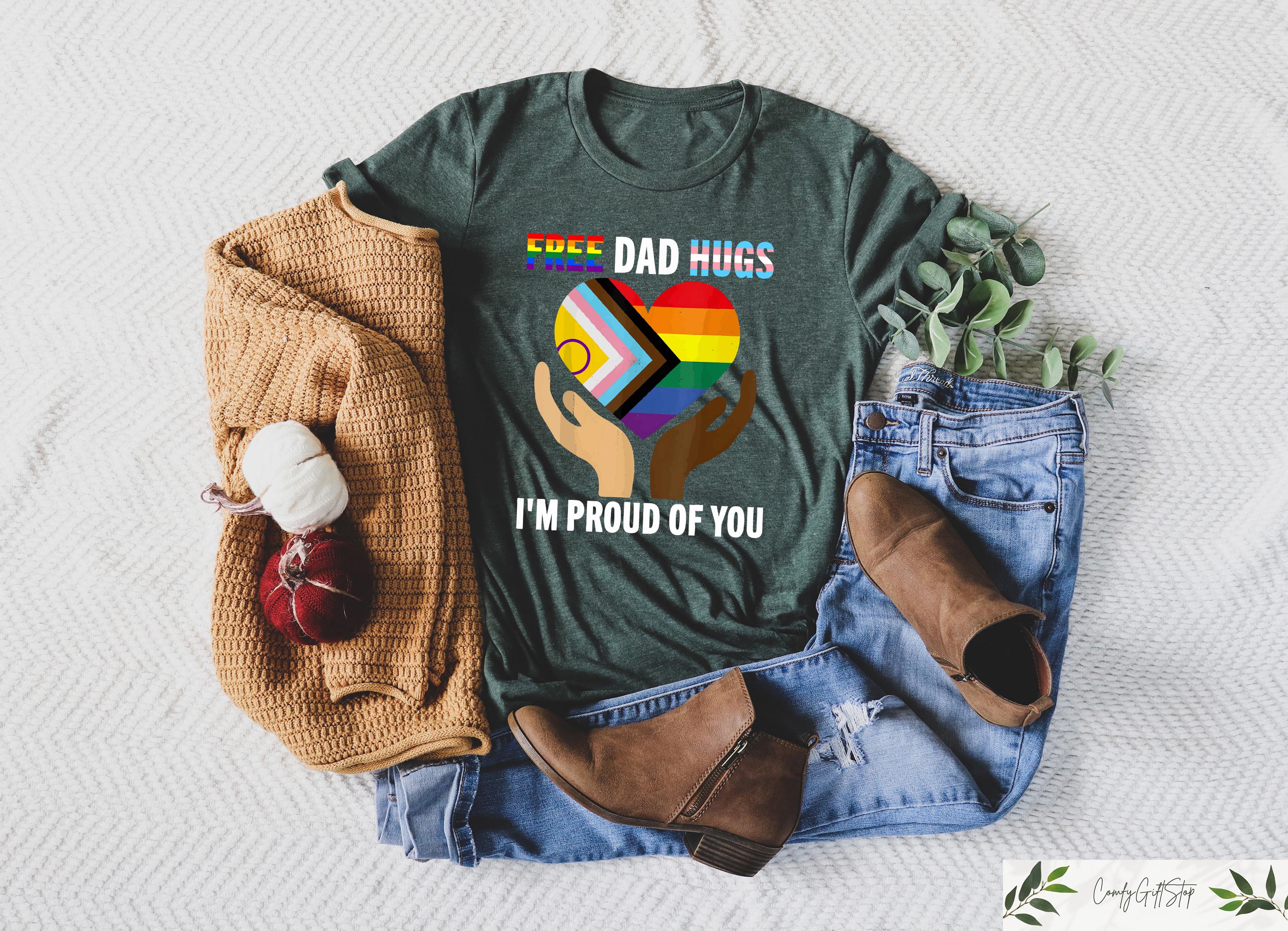 Retro Comfort Free Dad Hugs T shirt Gay Dad Shirt LGBTQ Dad Gift Social Justice Crewneck Rainbow Trans Flag Tee Proud Ally Dad Shirt Graphic Tee – Soft Feel · Trending Graphic Apparel