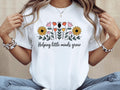 Helping Little Minds Grow Shirt Floral Shirt Teacher Gift Cute Teacher Shirt Appreciative Teacher New Teacher Gifted Teachers Tee Graphic Tee – Fan Favorite · Top Pick For Any Outfit