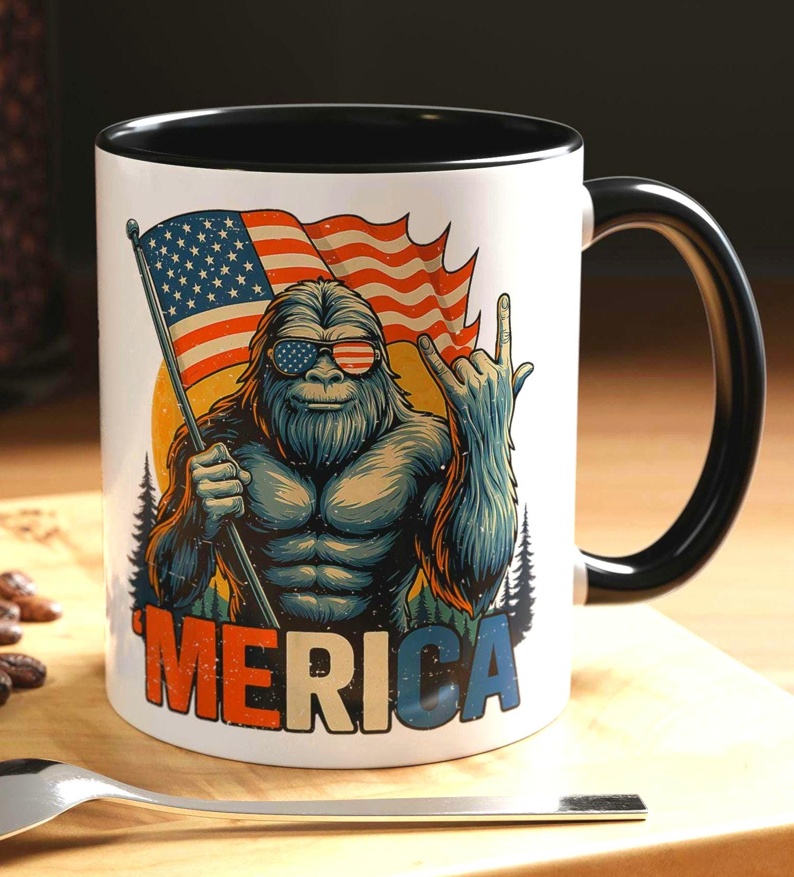 Bigfoot Patriotic Coffee Mug Sasquatch USA Independence Day Cup Yeti Stars and Stripes Mug 4th of July Novelty Gift 11 oz or 15oz Mugs Graphic Tee – Premium Graphic · Perfect For Daily Wear
