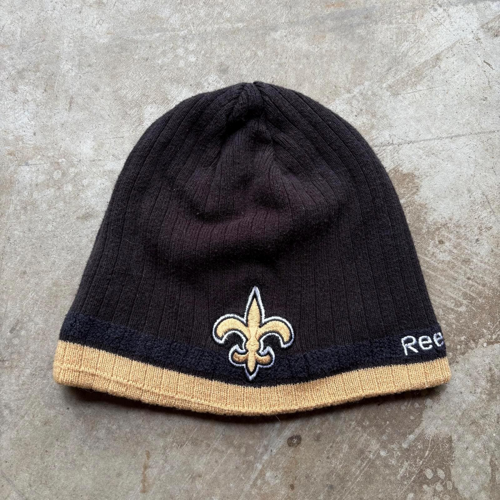 Vintage Y2K New Orleans Saints Reebok NFL Grunge Beanie Graphic Tee – Cozy Vibes · Trending Graphic Apparel